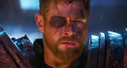 Thor (Chris Hemsworth) looks on, completely helpless, as Thanos (Josh Brolin) slaughters his friends, family, and people in Avengers: Infinity War (2018), Marvel Entertainment via Blu-ray