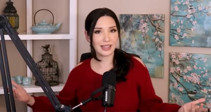 Lauren Chen in a red sweater on her Mediaholic YouTube channel.