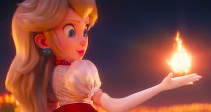 Princess Peach (Anya Taylor Joy) unlocks the power of a Fire Flower in The Super Mario Bros. Movie (2023), Illumination Entertainment