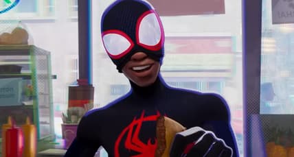 Miles Morales (Shamiek Moore) enjoys a snack while confronting The Spot (Jason Schwartzman) in Spider-Man: Across the Spider-Verse (2023), Sony Animation
