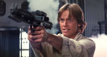 Luke Skywalker (Mark Hamill) blast some Stormtroopers in Star Wars Episode IV: A New Hope (1977), Lucasfilm