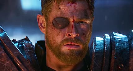 Thor watches helplessly as Thanos slaughters his people in Avengers: Infinity War (2018), Marvel