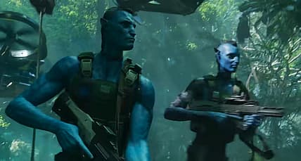 Quaritch (Stephen Lang) leads a platoon onto the surface of Pandora in Avatar: The Way of Water
