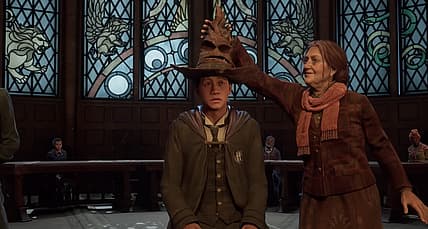 Professor Matilda Weasley places Sorting Hat on player character's head in Hogwarts Legacy (2022)