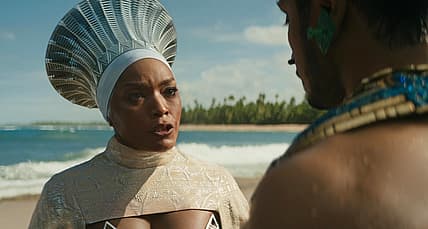 Queen Ramonda (Angela Bassett) defies Namor's (Tenoch Huerta) threats in Black Panther: Wakanda