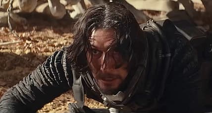 Mills (Adam Driver) is taken by surprise in 65 (2023), Sony Pictures