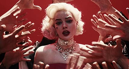 Margot Robbie as Harley thinking she is Marilyn