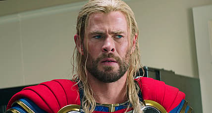 Thor (Chris Hemsworth) receives some bad news in Thor: Love and Thunder (2022), Marvel Entertainment