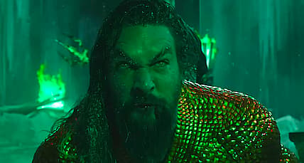 Aquaman (Jason Momoa) stands before Black Manta (Yahya Abdul-Mateen) in Aquaman and the Lost
