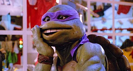 Donatello goes "Oops" after kicking a thug in Teenage Mutant Ninja Turtles II: The Secret of The Ooze (1991), New Line Cinema