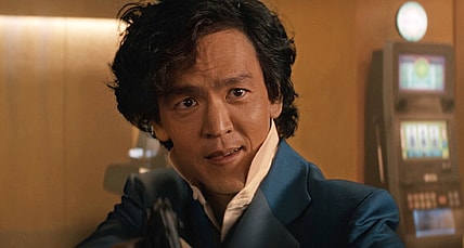 Spike Spiegel (John Cho) smirks in Cowboy Bebop Season 1 Episode 1 "Cowboy Gospel" (2021), Netflix
