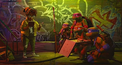 April O'Neil and the Teenage Mutant Ninja Turtles via Teenage Mutant Ninja Turtles: Mutant Mayhem