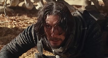 Mills (Adam Driver) is taken by surprise in 65 (2023), Sony Pictures