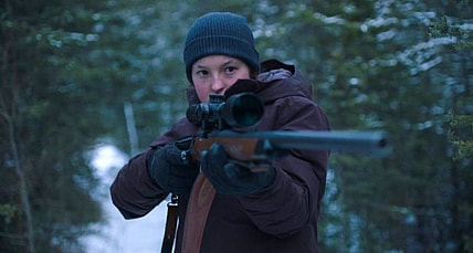 Bella with a gun