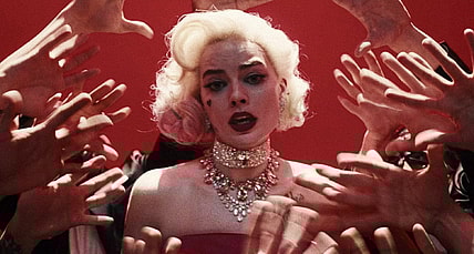 Margot Robbie as Harley thinking she is Marilyn