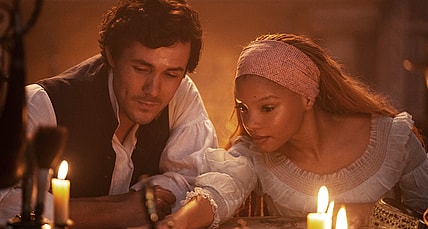 (L-R): Jonah Hauer-King as Prince Eric and Halle Bailey as Ariel in Disney's live-action THE LITTLE MERMAID. Photo by Giles Keyte. © 2023 Disney Enterprises, Inc. All Rights Reserved.