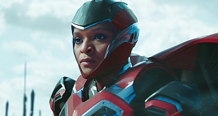Riri Williams (Dominique Thorne) listens on as Shuri (Letitia Wright) declares victory in Black Panther: Wakanda Forever (2022), Marvel Entertainment