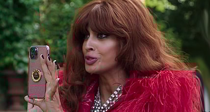 Titania (Jameela Jamil) snaps a photo of Daredevil (Charlie Cox) in She-Hulk: Attorney at Law Season 1 Episode 9 "Whose Show Is This?" (2022), Marvel Entertainment via Disney Plus