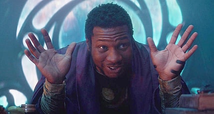 He Who Remains (Jonathan Majors) explains to Loki (Tom Hiddleston) and Sylvie (Sophia Di Martino) how his other variations attempted to conquer the multiverse in Loki (2021), Marvel Studios