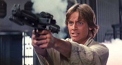 Luke Skywalker (Mark Hamill) blast some Stormtroopers in Star Wars Episode IV: A New Hope (1977), Lucasfilm