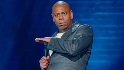 Dave Chappelle delivers a punchline in The Closer (2023), Netflix