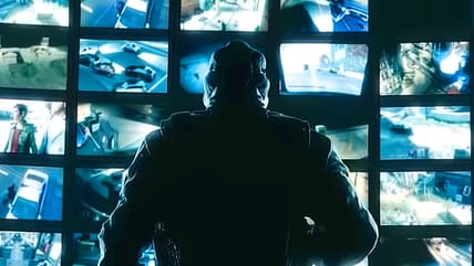 Mute (Gary Milner) looks out on CCTV feeds he's about to cut off in Tom Clancy's Rainbow Six Siege (2015) Ubisoft