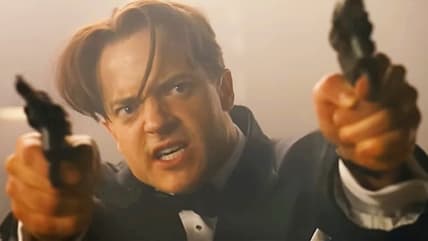 Brendan Fraser is cocked, locked, and loaded for another round in The Mummy: Tomb of the Dragon Emperor (2008), Universal Pictures