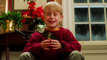 Kevin (Macaulay Culkin) is ready for more in Home Alone (1990), 20th Century Fox