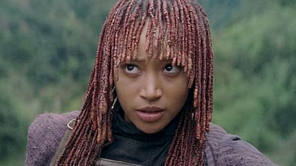 Mae (Amandla Stenberg) doubts Qimir's (Manny Jacinto) bravado in The Acolyte Season 1 Episode 4