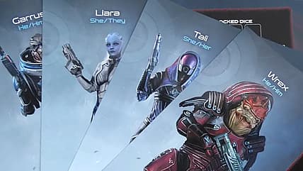Character sheets for Wrex, Tali, Liara, and Garrus in Mass Effect: The Board Game – Priority