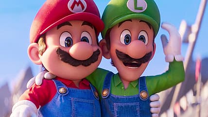 Mario (Chris Pratt) and Luigi (Charlie Day) celebrate saving the day in The Super Mario Bros. Movie