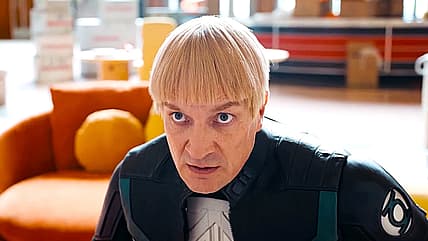 Guy Gardner (Nathan Fillion) wants Lois (Rachel Brosnahan) to know chicks dig his hair in Superman