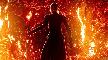 A Sorceress surveys destruction from her flames in Path of Exile II (2025), Grinding Gear Games