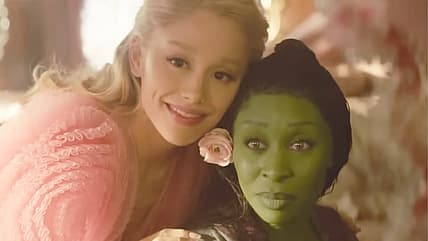 Glinda (Ariana Grande) helps improve Elphaba's (Cynthia Erivo) social status in Wicked (2024)