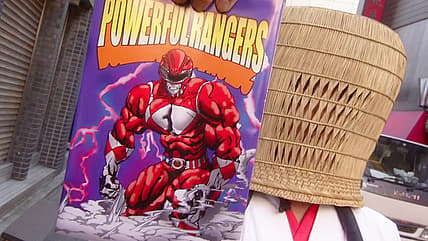 Katsuyuki Konishi's mysterious priest offers Masato Wada's AkibaRed a Powerful Rangers bible in