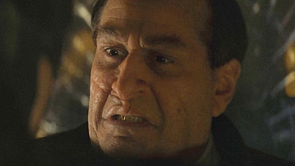 The Dark Knight (Robert Pattinson) demands answers from The Penguin (Colin Farrell) in The Batman (2022), Warner Bros. Pictures