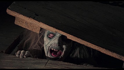 Cheryl (Ellen Sandweiss) emerges from the cabin's cellar in Evil Dead (1981), Renaissance Pictures