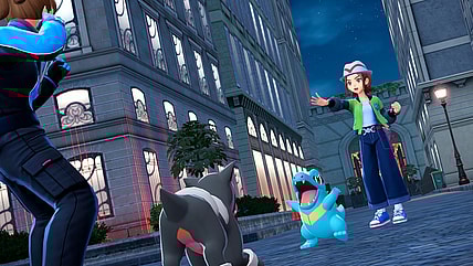 The player and their Totodile fight an opposing trainer's Houndour in Pokémon Legends: Z-A (2025), Nintendo