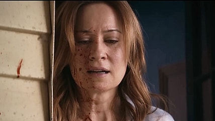 Camille Sullivan is stunned by what Amazon left on her porch in Shelby Oaks (2025), Neon