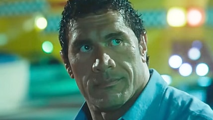 Mark Kerr (Dwayne Johnson) goes to the park for some rides and cotton candy in The Smashing Machine (2025), A24