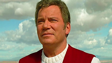 Captain Kirk (William Shatner) stands defiant against Tolian Soran (Malcolm McDowell) in Star Trek Generations (1994), Paramount Pictures