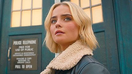 Ruby (Millie Gibson) prepares to take her first step inside the TARDIS in Doctor Who Series 14 Episode 0 "The Church On Ruby Road" (2023), BBC