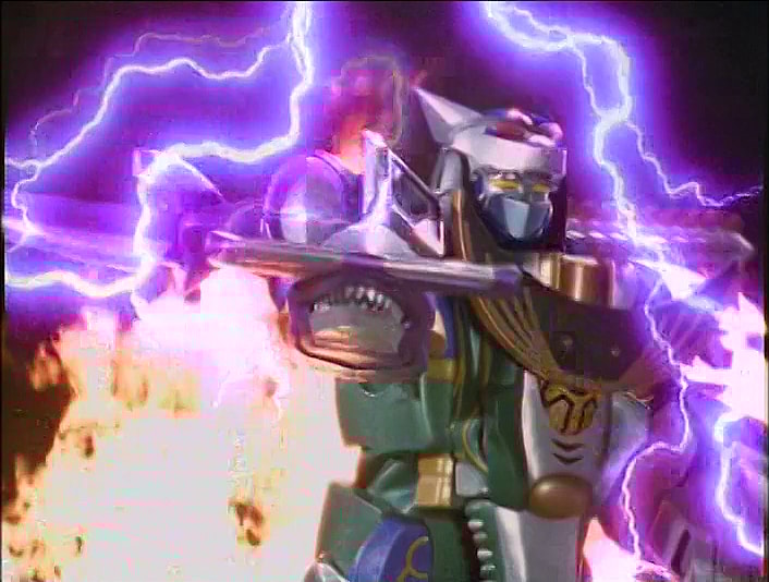GaoBlue (Takeru Shibaki) unleashes the combined might of the
Hyakuju Gattai GaoHunter in
Hyakuju Sentai Gaoranger Episode 24 "Quest 24: The Silver World Flashes!!" (2001), Toei Co. Ltd.