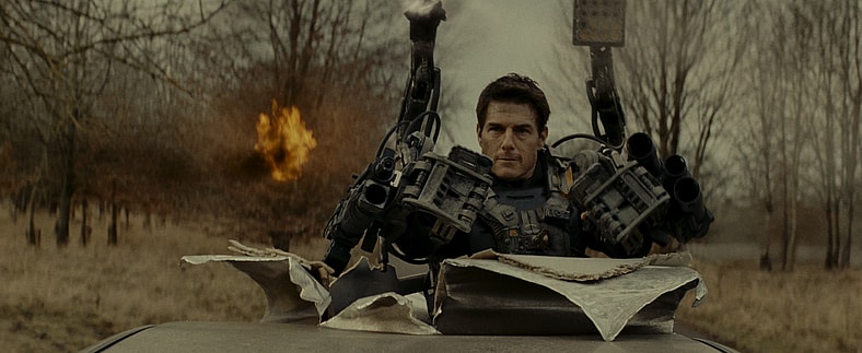 Major Cage (Tom Cruise) guns down an attacking Mimic in Edge of Tomorrow (2014), Warner Bros. Pictures