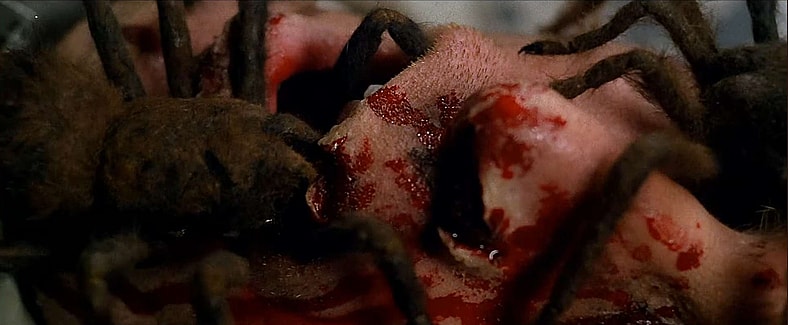 Lucio Fulci gets a mouthful of tarantula fangs in The Beyond (1981), Aquarius Releasing 