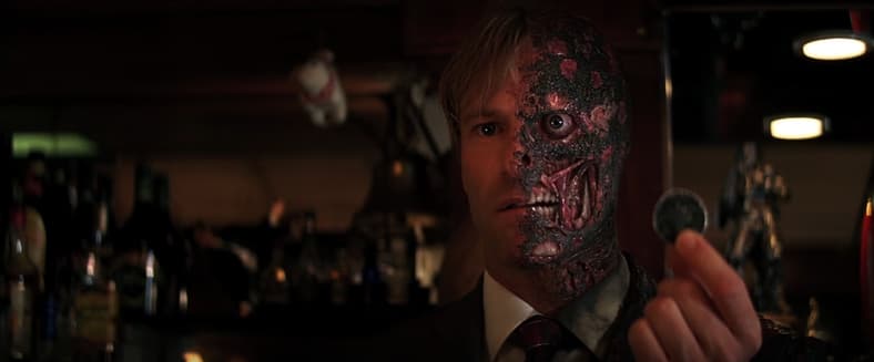 Harvey Two-Face Dent determines Detective Wuertz's luck in The Dark Knight (2008), Warner Bros