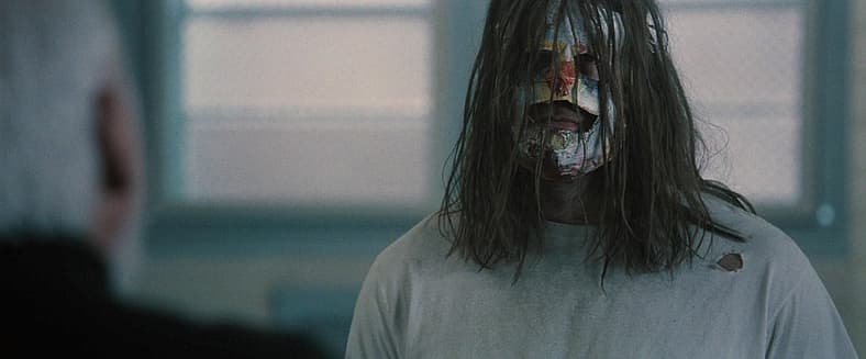Myers listens to Dr. Loomis in Halloween (2007), Dimension Films