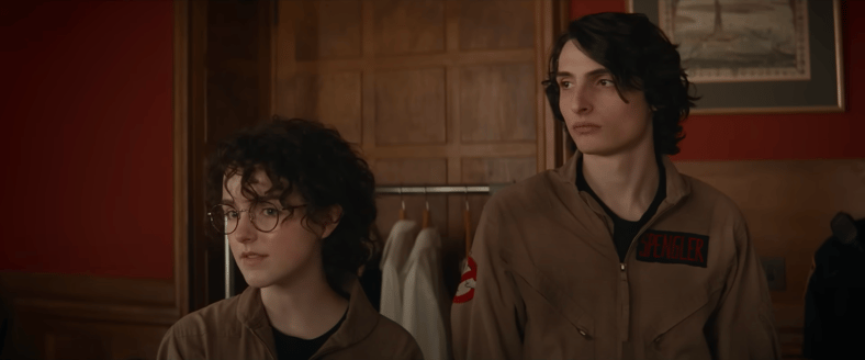 Mckenna Grace as Phoebe Spengler and Finn Wolfhard as Trevor Spengler in Ghostbusters: Frozen Empire