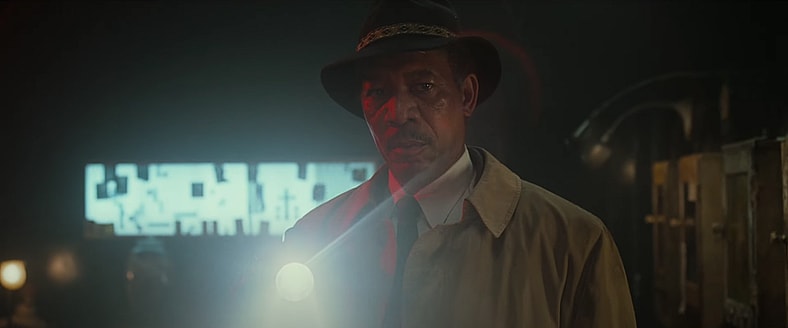 Morgan Freeman sheds light on the case in Se7en (1995), New Line Cinema