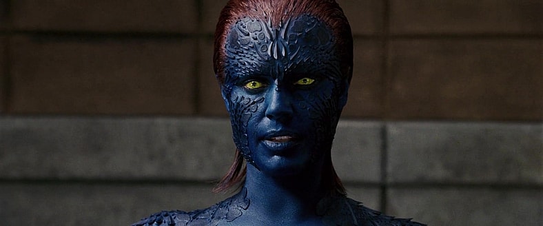 Mystique (Rebecca Romijn) is interrogated by an FBI Agent (Anthony Heald) in X-Men: The Last Stand (2006), 20th Century Fox
